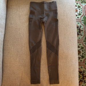 Alala x Equinox Workout Leggings in Dark Gold